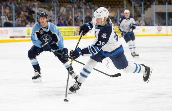 Manitoba Moose left-winger Jeff Malott takes a shot Wednesday against the Admirals in Milwaukee. (Milwaukee Admirals photo)