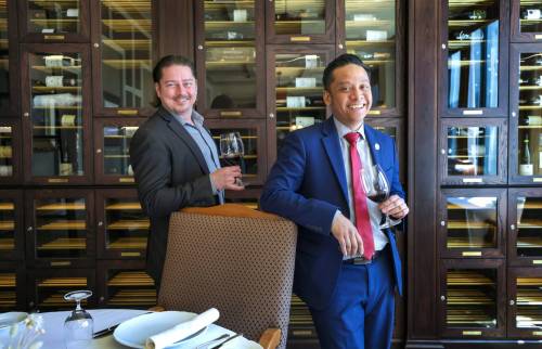 RUTH BONNEVILLE / WINNIPEG FREE PRESS
                                Sean Dolenuck (left) and Domer Rafael of the Canadian Association of Professional Sommeliers, Manitoba chapter, invite wine lovers to participate in MB Somm Week.