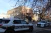 Police on Furby Street after the stabbing Tuesday evening. (Tyler Searle / Winnipeg Free Press)