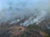 The government is closely monitoring local conditions as Manitoba firefighters arrive in Alberta to help tackle wildfires that have forced a state of emergency in the western Prairie province. (Government of Alberta)