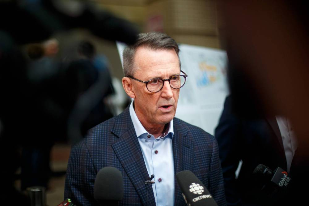 Mark Chipman, executive chairman of the Winnipeg Jets and owner of True North Sports and Entertainment, speaking with media following the announcement. (Mike Deal / Winnipeg Free Press)