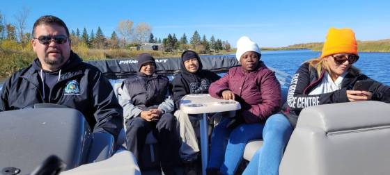 University of Manitoba researchers and members of Brokenhead Ojibway Nation boat out at Beaconia Marsh to assess progress of a wild rice restoration project. (Supplied)