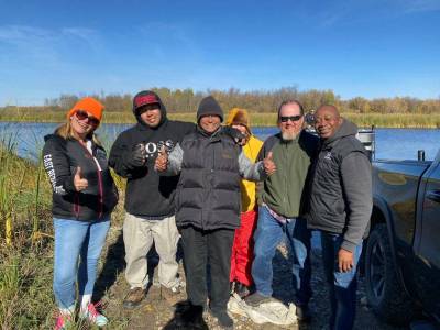 SUPPLIED
                                U of M researchers and Brokenhead residents give the thumbs up after reviewing early progress of the wild rice-growing project.