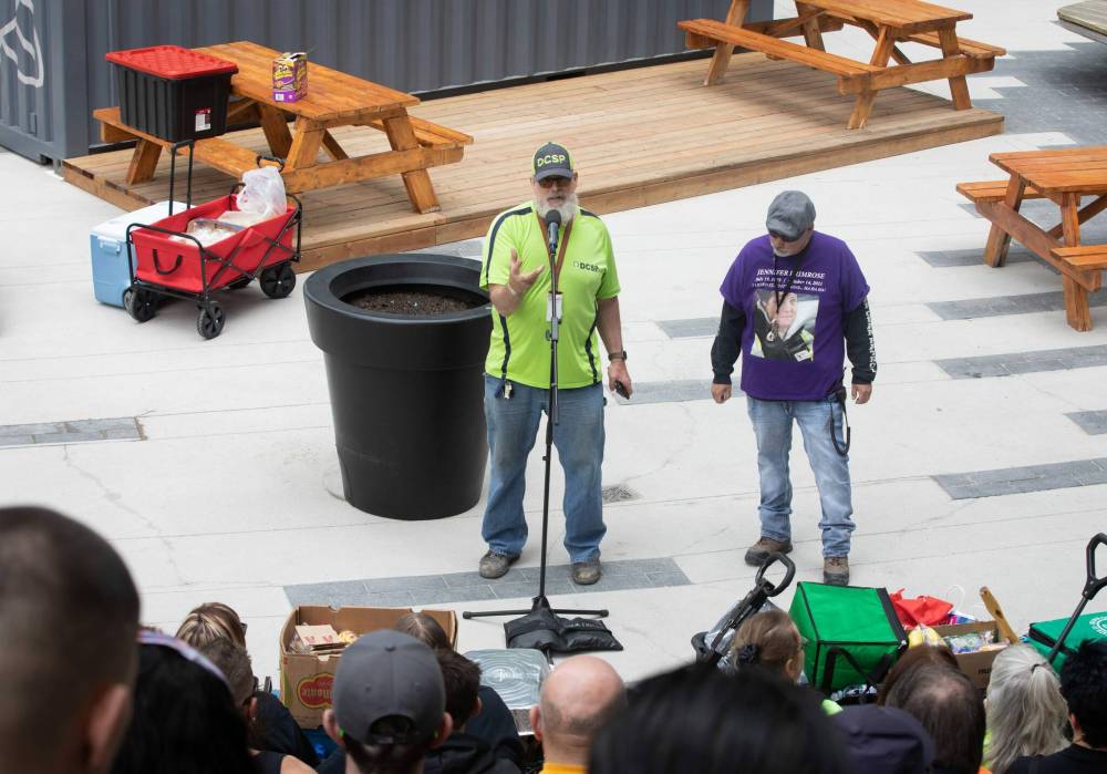 JESSICA LEE / WINNIPEG FREE PRESS
Mitch Bourbonniere, activist and co-organizer of the event, spoke to a group of community patrol groups at True North Square on Saturday. The groups of about a hundred patrolled around the downtown core afterwards, handing out water and snacks.