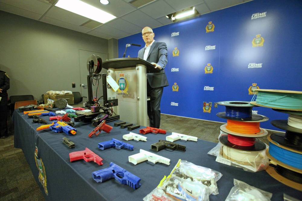 ERIK PINDERA / FREE PRESS FILES
Police seized 3D-printed handgun receivers, a 3D-printed AR-15-style rifle that looked like a Nerf toy gun, various firearms parts, illicit drugs and a 3D printer.