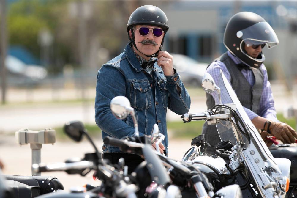 BROOK JONES / WINNIPEG FREE PRESS
Victor Lopes loosens his helmet strap after completing the annual Distinguished Gentleman’s Ride on his 2003 Yamaha Road Star.