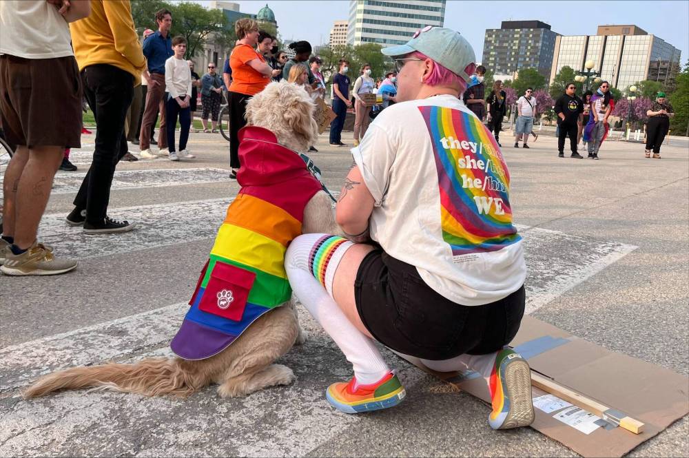 Roughly 200 people showed up to a Tuesday rally in Winnipeg to oppose book banning in Manitoba schools. (Maggie MacIntosh / Winnipeg Free Press)