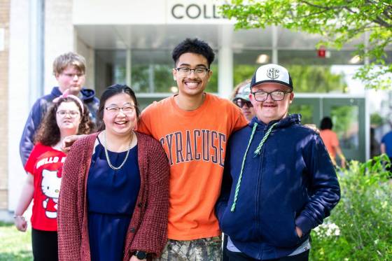 Orion Remoquillo, centre, a grade 12 student who volunteers with students with special needs, with Sophia Ly and Devin Bell (two of the students he volunteers with) at Garden City Collegiate. (Mikaela MacKenzie / Winnipeg Free Press)