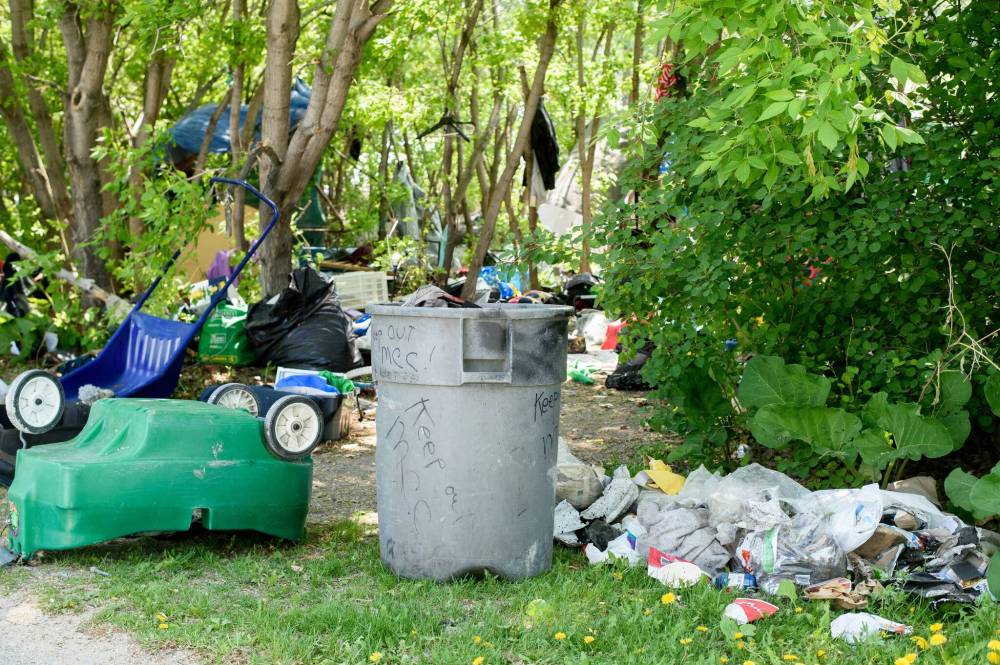 MIKE SUDOMA / WINNIPEG FREE PRESS
Trash collected from an encampment along the Red River near Waterfront Drive awaits removal last week.