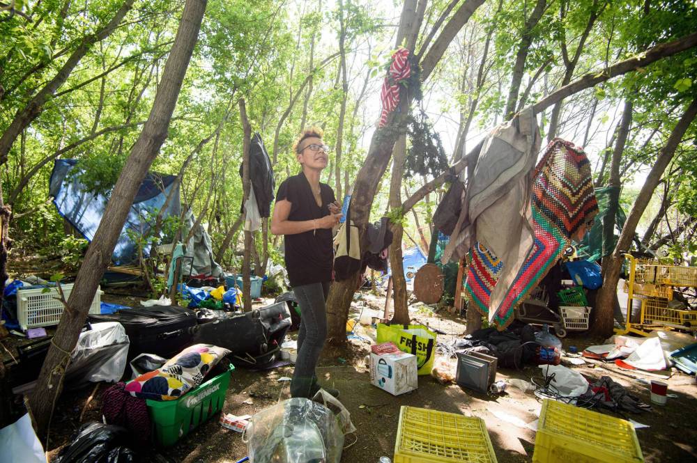 Mike Sudoma / Winnipeg Free Press
‘Bags and bags of garbage come in from the (river) every day,’ says Kathy Smith who is staying in an encampment along Waterfront Drive, in the Fort Douglas Park neighbourhood.