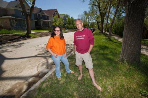 MIKE DEAL / WINNIPEG FREE PRESS
                                Amanda Palson (left) and Brian Pincott helped organize block parties in West Broadway the last two summers to help unite the community.