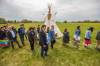 Mike Deal / Winnipeg Free Press Files
                                Leaders and dancers at the ceremony with the Retreat of Eagle Staff Flags during the Treaty One Nation Land Reclamation Ceremony for the Naawi-Oodena Treaty One Jointly Held lands, on the former Kapyong Barracks lands in Winnipeg.