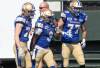 Jason Franson / THE CANADIAN PRESS
                                Blue Bombers quarterback hopeful Tyrrell Pigrome (centre) scampered for a 45-yard touchdown Saturday in CFL pre-season action against the Elks in Edmonton.