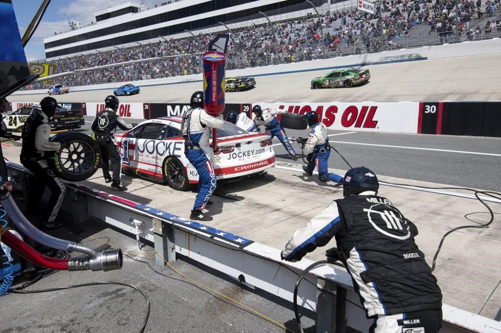 Ross Chastain (1) pits after winning stage 2 during the NASCAR 400 auto race at Dover Motor Speedway Monday, May 1, 2023, in Dover, Del. (AP Photo/Jason Minto)