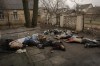 Bodies of men, some with their hands tied behind their backs, lie on the ground in Bucha, Ukraine, April 3, 2022. The image was part of a series of images by Associated Press photographers that was awarded the 2023 Pulitzer Prize for Breaking News Photography. (AP Photo/Vadim Ghirda)