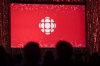 The CBC logo is projected onto a screen in Toronto on May 29, 2019. The CBC and Radio-Canada are returning to Twitter after pausing activity last month over their designation as 