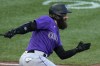 Colorado Rockies' Charlie Blackmon watches his RBI single off Pittsburgh Pirates starting pitcher Luis Ortiz during the fourth inning of a baseball game in Pittsburgh, Tuesday, May 9, 2023. (AP Photo/Gene J. Puskar)