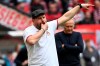 Cologne's coach Steffen Baumgart reacts during the German Bundesliga soccer match between 1. FC Cologne and SC Freiburg in Cologne, Germany, Saturday, April 29, 2023. (Federico Gambarini/dpa via AP)