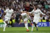 Manchester City's Erling Haaland, top center, is challenged by Real Madrid's Nacho during the Champions League semifinal first leg soccer match between Real Madrid and Manchester City at the Santiago Bernabeu stadium in Madrid, Spain, Tuesday, May 9, 2023. (AP Photo/Manu Fernandez)