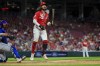 Cincinnati Reds' Jonathan India reacts as he strikes out during the ninth inning of the team's baseball game against the New York Mets in Cincinnati, Wednesday, May 10, 2023. The Mets won 2-1. (AP Photo/Aaron Doster)