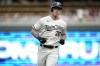 Minnesota Twins' Max Kepler runs the bases after hitting a solo home run during the first inning of the team's baseball game against the San Diego Padres, Wednesday, May 10, 2023, in Minneapolis. (AP Photo/Abbie Parr)