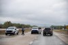 Police block the road into the wildfires near Entwhistle Alberta on Sunday May 7, 2023. Environment Canada has blanketed all of Alberta and most of British Columbia in special heat advisories as temperatures are expected to be up to 15 degrees above normal over the next several days. THE CANADIAN PRESS/Jason Franson.