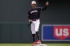 Minnesota Twins' Carlos Correa (4) points to the team dugout after hitting a two-run double during the seventh inning of a baseball game against the San Diego Padres, Thursday, May 11, 2023, in Minneapolis. (AP Photo/Abbie Parr)