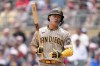 San Diego Padres' Ha-Seong Kim reacts after striking out during the seventh inning of a baseball game against the Minnesota Twins, Thursday, May 11, 2023, in Minneapolis. (AP Photo/Abbie Parr)