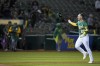 Oakland Athletics' Brent Rooker celebrates after hitting the game-winning, three-run home run against the Texas Rangers during the 10th inning of a baseball game in Oakland, Calif., Friday, May 12, 2023. (AP Photo/Godofredo A. Vásquez)