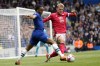 Chelsea's Raheem Sterling vies for the ball with Nottingham Forest's Joe Worrall, right, during the English Premier League soccer match between Chelsea and Nottingham Forest at Stamford Bridge stadium in London, Saturday, May 13, 2023. (AP Photo/Kirsty Wigglesworth)
