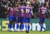 Crystal Palace's Eberechi Eze, left, celebrates scoring his side's second goal of the game with teammates during their English Premier League soccer match against Bournemouth at Selhurst Park, London, Saturday, May 13, 2023. (Bradley Collyer/PA via AP)