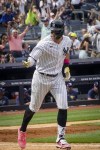 New York Yankees' Aaron Judge points to his dugout after hitting a two-run home run in the sixth inning of a baseball game against Tampa Bay Rays, Saturday, May 13, 2023, in New York. (AP Photo/Bebeto Matthews)