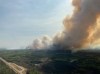 The Red Creek fire (G80223) burns in the Peace River Regional District of British Columbia in a May 5, 2023, handout photo. The Peace River Regional District in northern B.C. says it's lifted an evacuation order for residents of the Goodlow area near Boundary Lake, but is keeping an alert in place as crews continue to battle a nearby blaze.THE CANADIAN PRESS/HO-BC Wildfire Service *MANDATORY CREDIT*