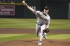 San Francisco Giants pitcher Anthony DeSclafani throws to an Arizona Diamondbacks batter during the first inning of a baseball game Saturday, May 13, 2023, in Phoenix. (AP Photo/Rick Scuteri)