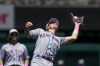 New York Mets third baseman Brett Baty (22) catches a fly ball hit by Washington Nationals' Dominic Smith during the fourth inning of the continuation of a suspended baseball game at Nationals Park, Sunday, May 14, 2023, in Washington. (AP Photo/Alex Brandon)