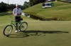 Steve Stricker poses with the trophy and the tournament winner's bicycle after the final round of a Champions Tour golf tournament, Sunday, May 14, 2023, in Hoover, Ala. (AP Photo/Butch Dill)