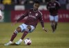 FILE - Colorado Rapids midfielder Max Alves (8) goes for the ball in the first half of an MLS soccer match Saturday, March 18, 2023, in Commerce City, Colo. Goias state District Attorney Fernando Cesconetto, the lead investigator of Brazil’s sprawling soccer match-fixing scandal, said he has uncovered potential evidence of wrongdoing by players in other countries. Cesconetto tells The Associated Press that the case of Rapids' Alves, who was reportedly named in the probe, could be prosecuted in the United States. (AP Photo/David Zalubowski, File)