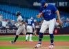 New York Yankees centre fielder Aaron Judge rounds the bases after hitting an opposite field home run as Toronto Blue Jays starting pitcher Alek Manoah reacts during first inning AL MLB action in Toronto on Monday May 15, 2023. THE CANADIAN PRESS/Frank Gunn