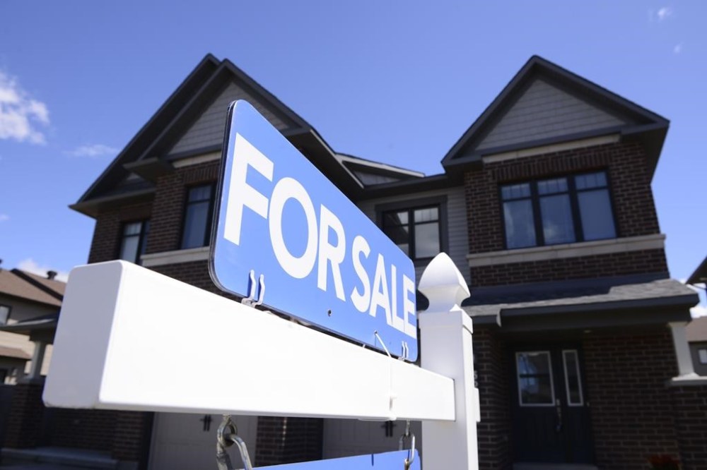 A new home is displayed for sale in a housing development in Ottawa on Tuesday, July 14, 2020. Statistics Canada says the first increase in annual inflation since its June 2022 peak was driven by higher mortgage interest costs.THE CANADIAN PRESS/Sean Kilpatrick