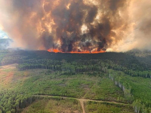 Hot and dry conditions are expected to continue as wildfires throughout western Canada have forced thousands of evacuations and air quality warnings due to smoke as far east as northern Ontario.The Bald Mountain Wildfire is shown in the Grande Prairie Forest Area on Friday May 12, 2023 this handout image provided by the Government of Alberta. THE CANADIAN PRESS/HO-Government of Alberta Fire Service **MANDATORY CREDIT **