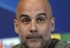 Manchester City manager Pep Guardiola meets the media during a press conference ahead of Wednesday's Champions League, semifinal, return-leg soccer match against Real Madrid, at City Football Academy, Manchester, England, Tuesday May 16, 2023. (Martin Rickett/PA via AP)