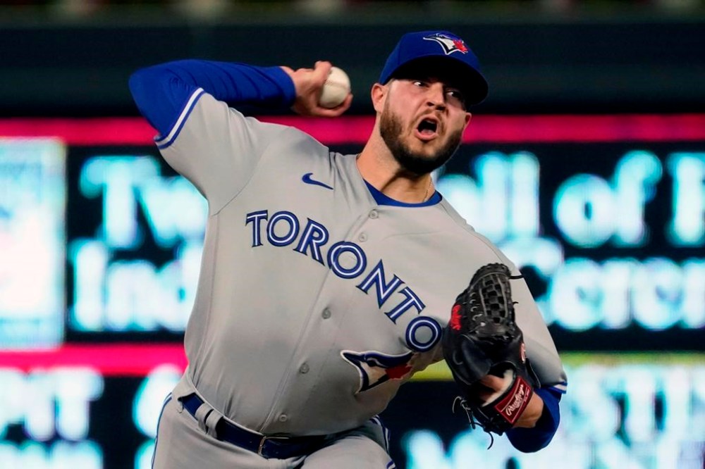 Toronto Blue Jays pitcher Thomas Hatch throws against the Minnesota Twins in the fifth inning of a baseball game, Thursday, Sept. 23, 2021, in Minneapolis. Right-handed reliever Hatch has been recalled by the Blue Jays. THE CANADIAN PRESS/AP/Jim Mone