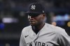 New York Yankees starting pitcher Domingo German (0) walks back to the dugout following third inning MLB American League baseball action against the Toronto Blue Jays in Toronto, on Tuesday, May 16, 2023. THE CANADIAN PRESS/Chris Young