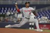 Washington Nationals starting pitcher Josiah Gray (40) aims a pitch during the first inning of a baseball game against the Miami Marlins, Tuesday, May 16, 2023, in Miami. (AP Photo/Marta Lavandier)