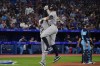 New York Yankees designated hitter Aaron Judge (99) celebrates his two-run home run against the Toronto Blue Jays with teammate Aaron Hicks (31) during eighth inning MLB American League baseball action in Toronto, on Tuesday, May 16, 2023. THE CANADIAN PRESS/Chris Young