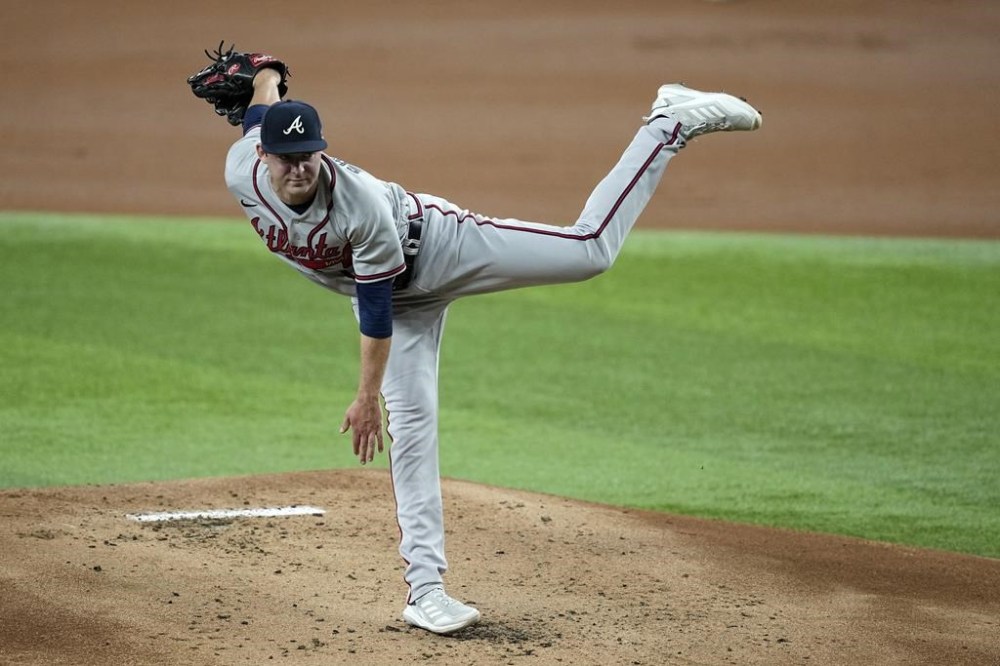 Atlanta Braves starting pitcher Jared Shuster follows throgh on his delivery to the Texas Rangers in the first inning of a baseball game, Tuesday, May 16, 2023, in Arlington, Texas. (AP Photo/Tony Gutierrez)
