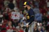 Milwaukee Brewers relief pitcher Devin Williams celebrates a 3-2 victory over the St. Louis Cardinals following a baseball game Tuesday, May 16, 2023, in St. Louis. (AP Photo/Jeff Roberson)