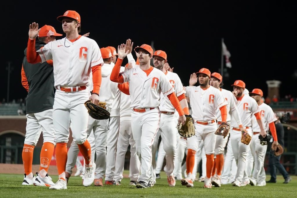 San Francisco Giants celebrate after the team's win ovr the Philadelphia Phillies in a baseball game in San Francisco, Tuesday, May 16, 2023. (AP Photo/Jeff Chiu)