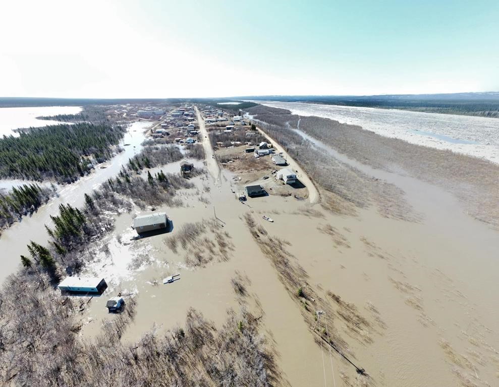 Flooding in the hamlet of Fort McPherson, N.W.T. is shown in a May 16, 2023 handout photo. The hamlet in the Beaufort Delta region has declared a local state of emergency due to flooding from the Peel River. THE CANADIAN PRESS/HO-Dean Charlie **MANDATORY CREDIT**