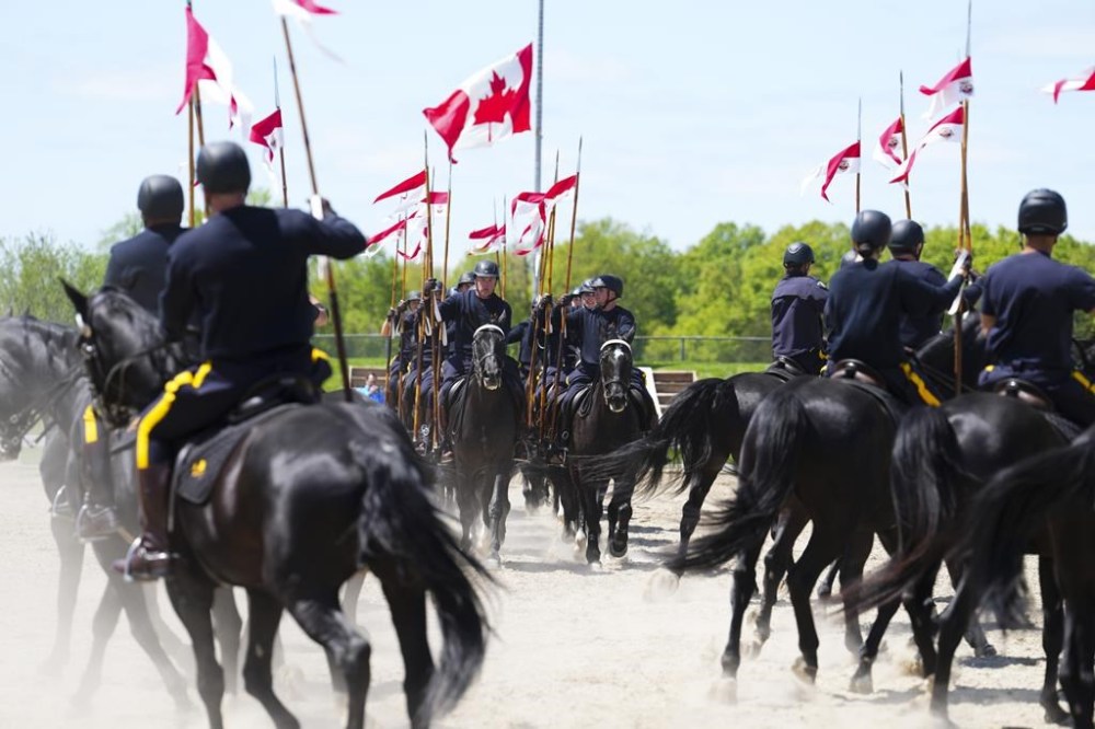 The Royal Canadian Mounted Police Musical Ride troop practices at their stables in Ottawa on Wednesday, May 17, 2023. This year marks the 150th Anniversary of the RCMP. THE CANADIAN PRESS/Sean Kilpatrick
